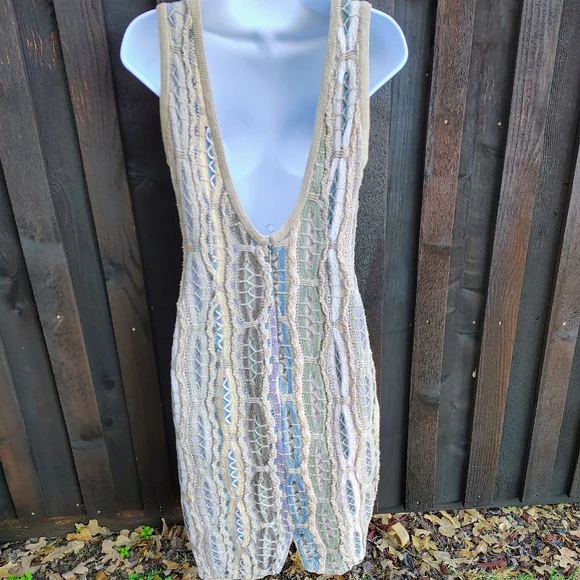 Elegant COOGI Sleeveless Dress - www.threedaughtersproperties.com